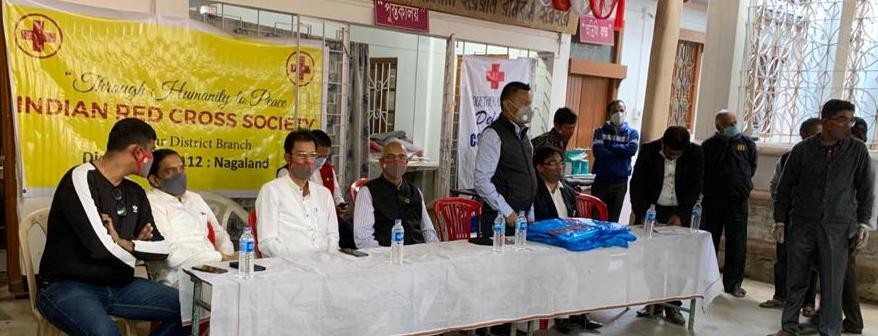 IRCS Dimapur Branch members at the relief material distribution programme in Dimapur on November 27.